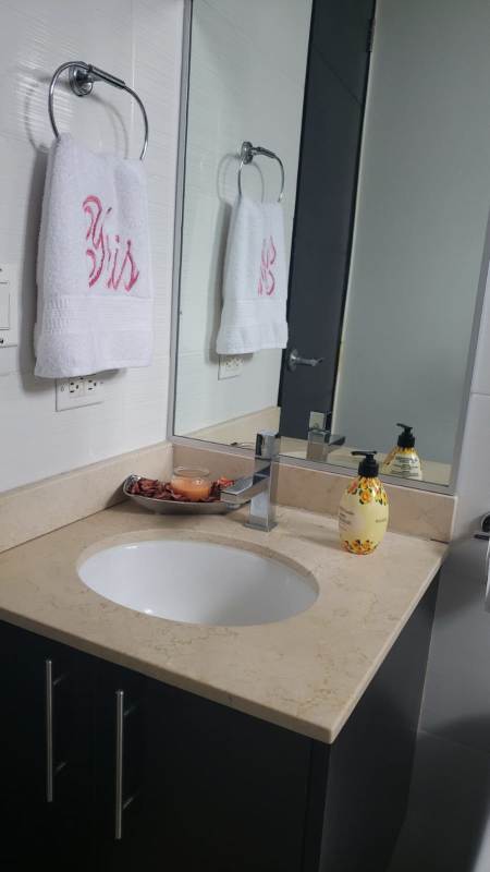 Bathroom with modern fixtures and tiles at Cosmopolitan Tower Via Transistmica Panama rental