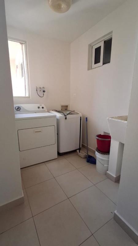 Laundry space with washer dryer hookup and utility sink PH Torres de Versalles Don Bosco Panama City