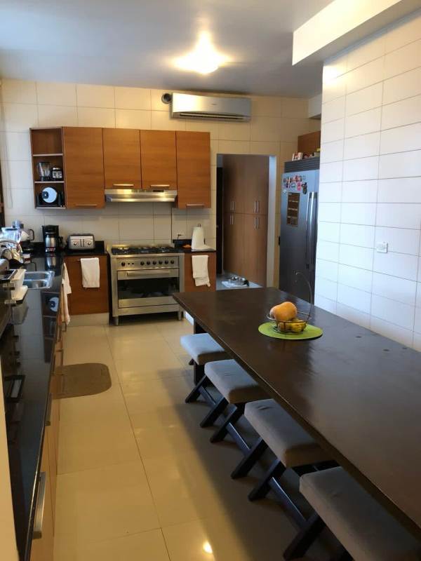 Luxury ensuite bathroom with bathtub and double vanity in PH Mirador Costa del Este Panama