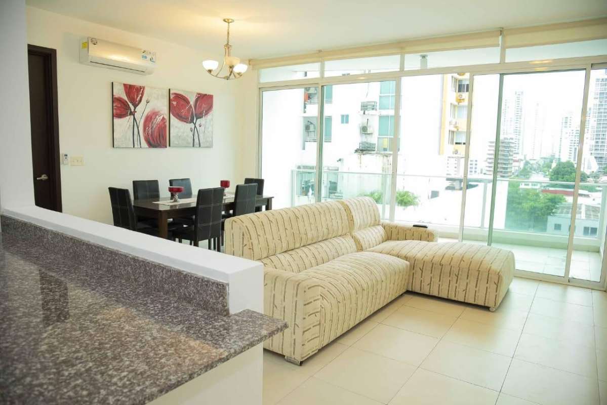 Contemporary granite kitchen with appliances in furnished apartment Panama City