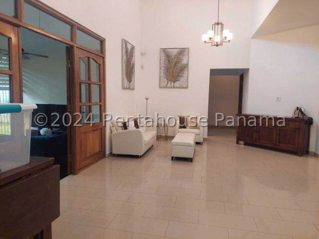 Large terrace with ceiling fans and garden views in rental house San Francisco Panama City