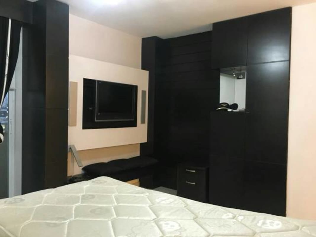 Dining area open to living with balcony and Pacific Ocean views in PH Ocean Club Panama