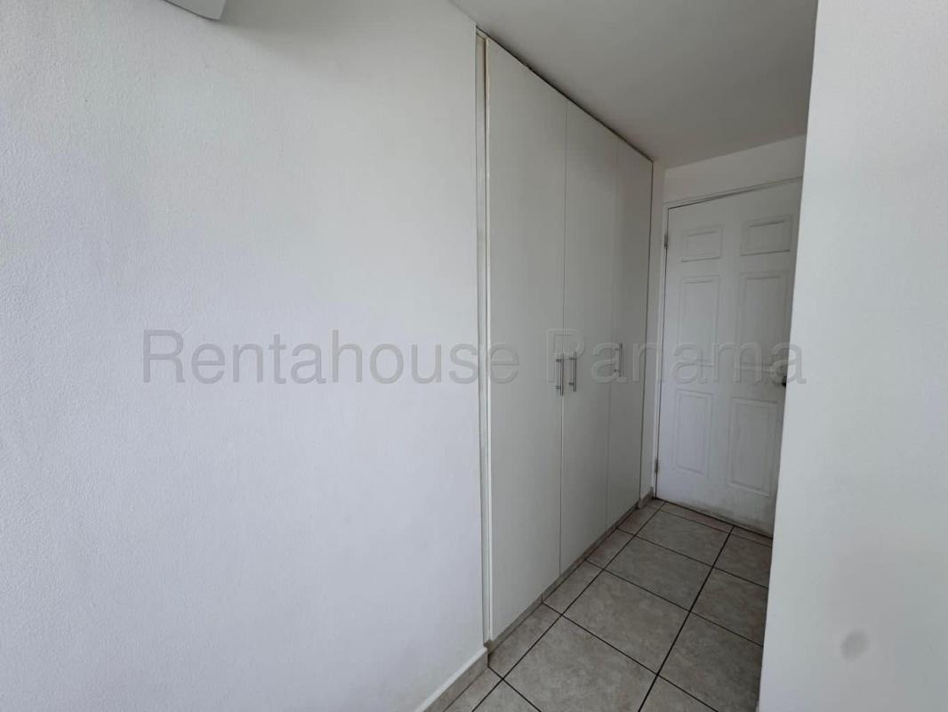 Bedroom showing ceramic tile floor, window, AC and closet in PH Sunshine Panama