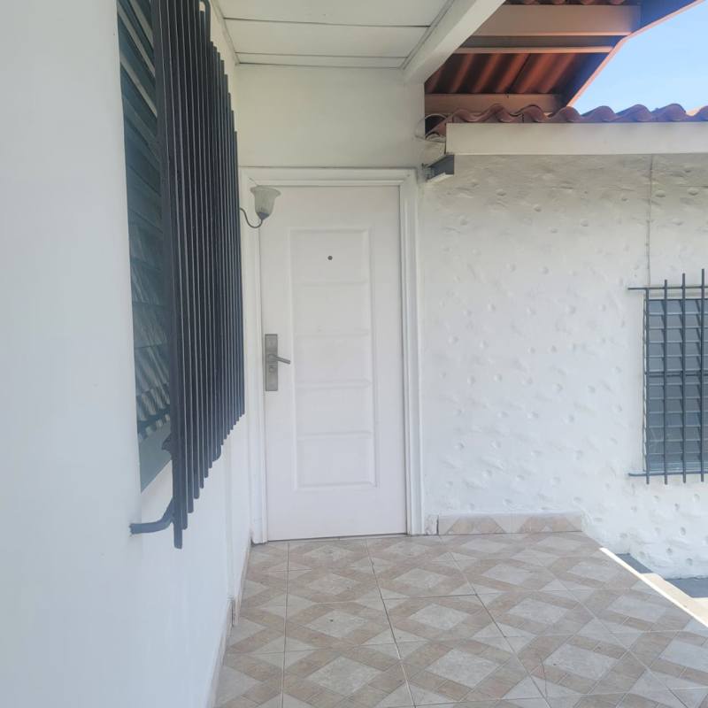 Third bedroom with closet space tile flooring in single family rental house Panama.