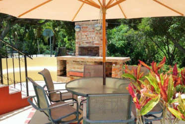 Balcony with hammock overlooking tropical beach and ocean Santa Clara Panama