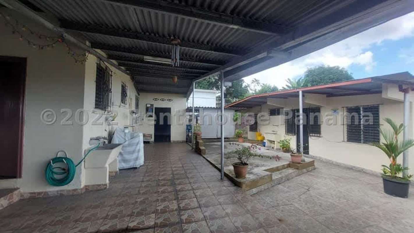 Bedroom with built-in closet large window garden view Betania Panama city home