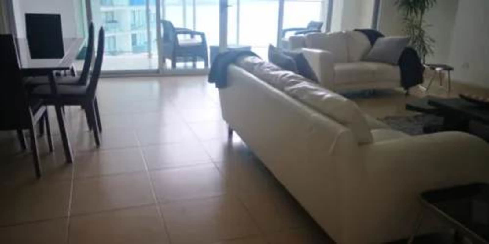 Modern open kitchen with island at PH El Oasis Punta Pacifica luxury apartment Panama
