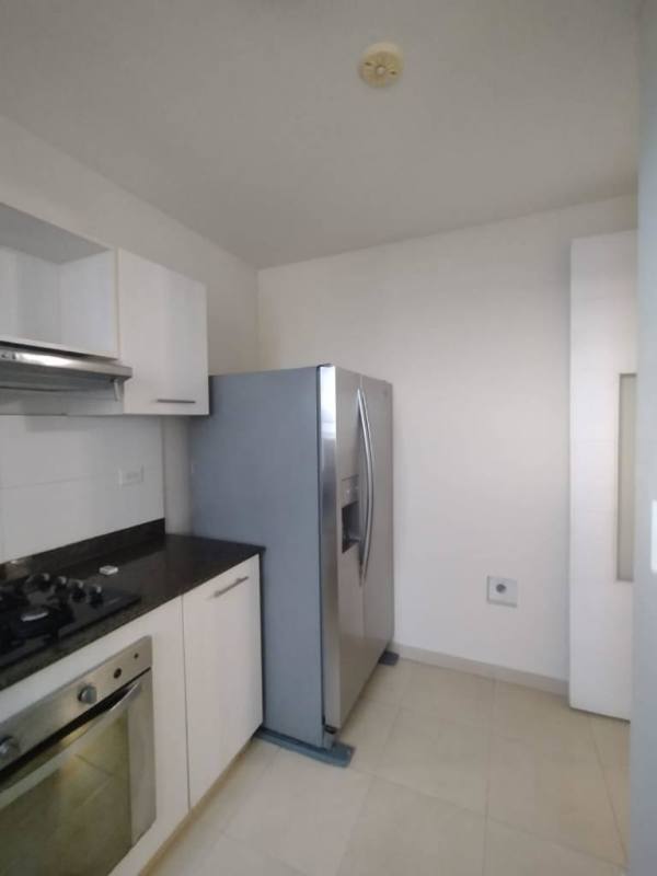 Bedroom with window, AC, ceiling fan, balcony view Torres de Versalles Panama City