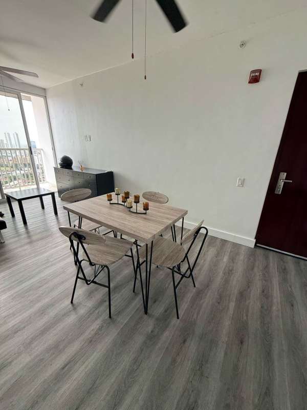 Furnished bedroom with blue decor air conditioning in PH Metro Plaza Vía España Panama City