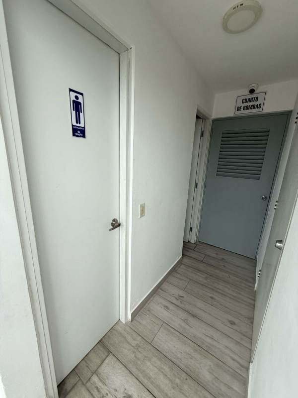 Private balcony with skyline and Pacific ocean view at PH Metro Plaza Vía España Panama City