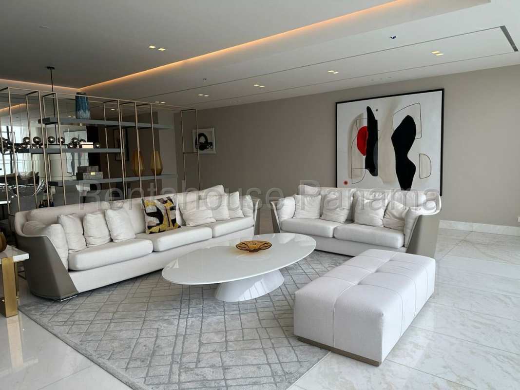 Large master suite with floor-to-ceiling windows and ocean views at The Residences Punta Pacifica Panama