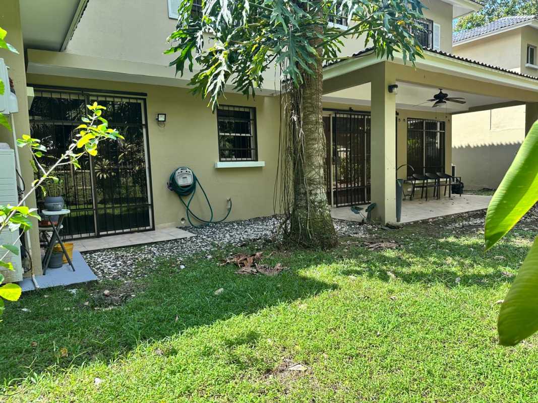 Private backyard with covered patio dining Embassy Gardens Clayton Panama rental home