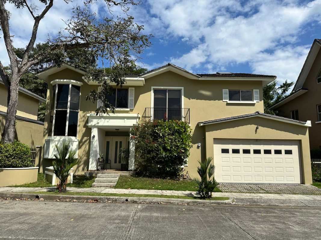 Front view Embassy Gardens Clayton two-story house with balcony and garage for rent Panama