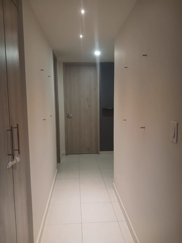 Modern kitchen with granite countertops cabinets appliances PH Torres de Versalles II Panama