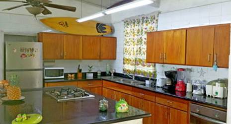 Beachfront patio area with pavers, railing, and stairs directly to sand Playa Corona Panama