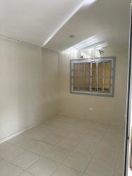 Modern kitchen with cabinets tile backsplash granite countertop Green Village Nuevo Arraiján Panama