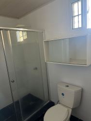 Living room with open kitchen design tiled floor Green Village Nuevo Arraiján Panama