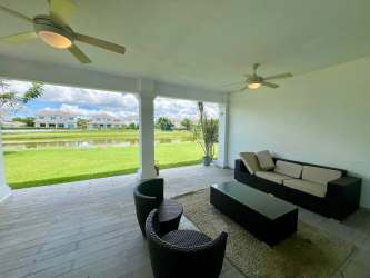 Bright open space with dining area and view to terrace at Bijao luxury villa Panama
