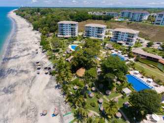 Bedroom with AC and closet overlooking lake in Quarry Heights Bijao Beach Panama