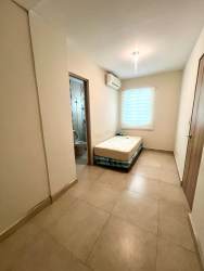 Aerial view of pools, beach access and condos at Bijao Beach Club Panama