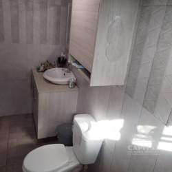 Farm estate dining room with wooden table, wall decor in Santa Ana countryside Los Santos Panama