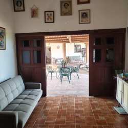 Dining area with traditional decor in farmhouse at Santa Ana estate Los Santos Panama