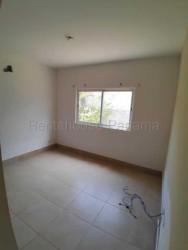 Large window bedroom with tile floor at Playa Dorada beach house Panama