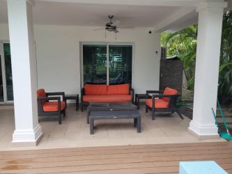 Open plan kitchen with granite countertops and dining area in Bijao Miraflores villa for sale