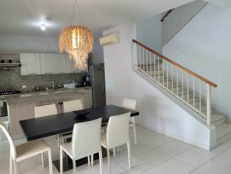 Open living area with natural light and access to terrace at Bijao Miraflores Villa for sale