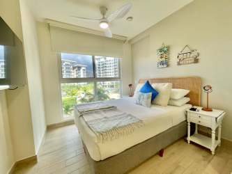 Modern coastal bedroom design with natural light in Punta Chame beachfront condo