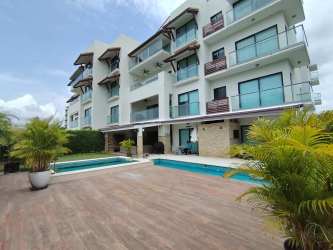 Infinity pool with Pacific ocean views at CasaMar Beachfront Resort in San Carlos Panama