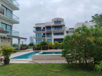 Bright furnished living room with terrace access ocean views CasaMar Resort San Carlos Panama