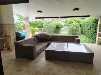 Spacious covered terrace lounge overlooking private pool and ocean CasaMar Resort Panama