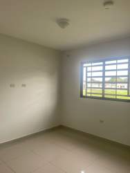 Empty bedroom with window and tile floor rental Residencial Bariloche Dolega Panama