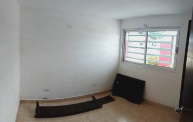 Minimalist bedroom with built-in wardrobe, large window, tile flooring in Panama Oeste