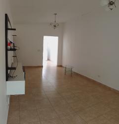 Minimalist living room with tile floor, white walls and natural lighting Vista Alegre Panama Oeste