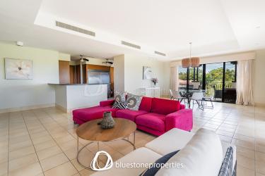 Spacious bathroom with granite countertops glass-enclosed shower Buenaventura Panama