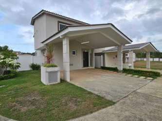 Contemporary open plan kitchen and dining with large windows Costa Verde Panama