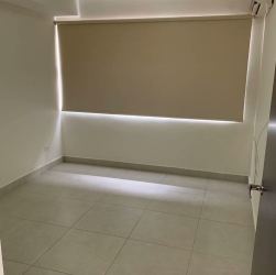 Bedroom with AC split unit and large window in Woodlands Panama Pacifico