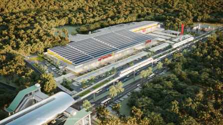 Aerial view large commercial complex with solar panels, retail units, parking surrounded by greenery Burunga Panama