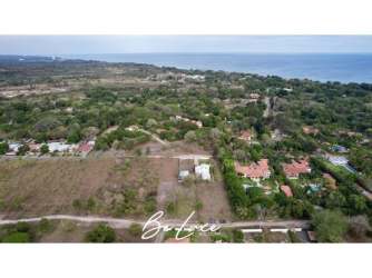Vacant fenced lot steps from Santa Clara Beach with nearby homes Panama real estate