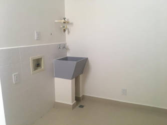 Open kitchen featuring granite countertop and white cabinetry in River Valley