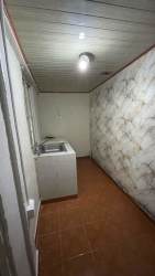 Private laundry room with sink inside apartment for rent in Ciudad de Colón Panama