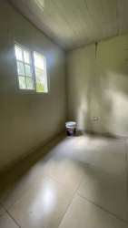 Basic bathroom with shower pedestal sink and black fixtures apartment rental Ciudad de Colón Panama