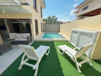Minimalist living area with tile floors and natural light in Senderos de Bambú Arraiján Panama
