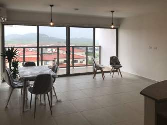 Master bedroom with private bathroom walk-in closet wood cabinetry PH Midrise Panama