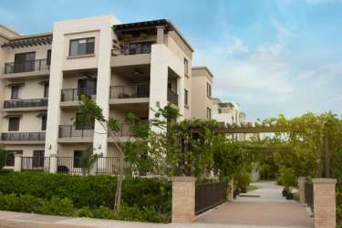 Modern multi-story residential with balconies and gardens at PH River Valley Veracruz