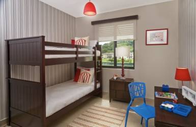 Kids bedroom with window views, bunk bed, and bright decor PH River Valley Panama Pacifico