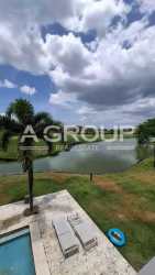 Spacious living dining area with large windows, modern design in luxury villa Buenaventura Panama