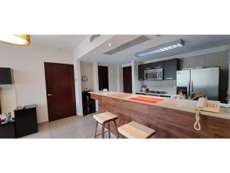 Modern kitchen with appliances, breakfast bar, stylish cabinets in PH Mosaic Panama